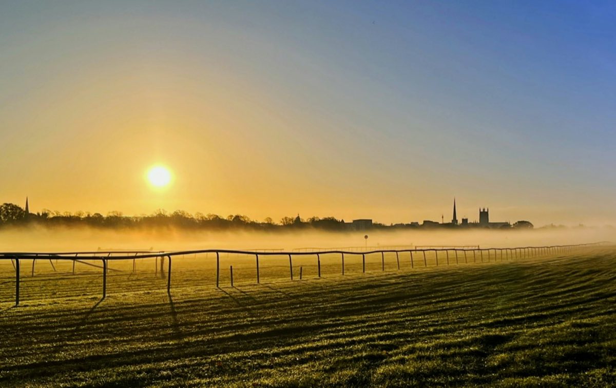 Sunrise mist over Worcester Racecourse with the cathedral on the skyline